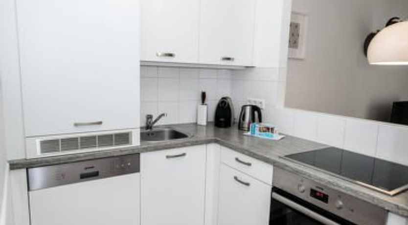 Photo of mit 1 Schlafzimmer & Saunabereich Apartment 7