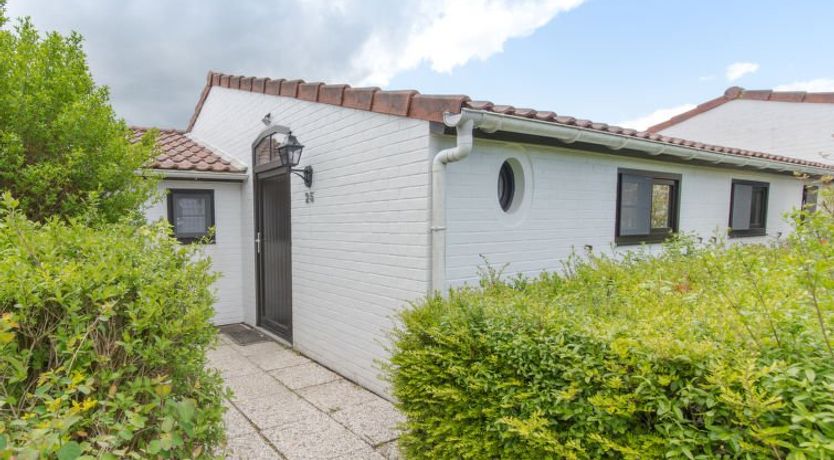 Photo of Duinenhuisje 25 parking and shared pool Holiday Home 4