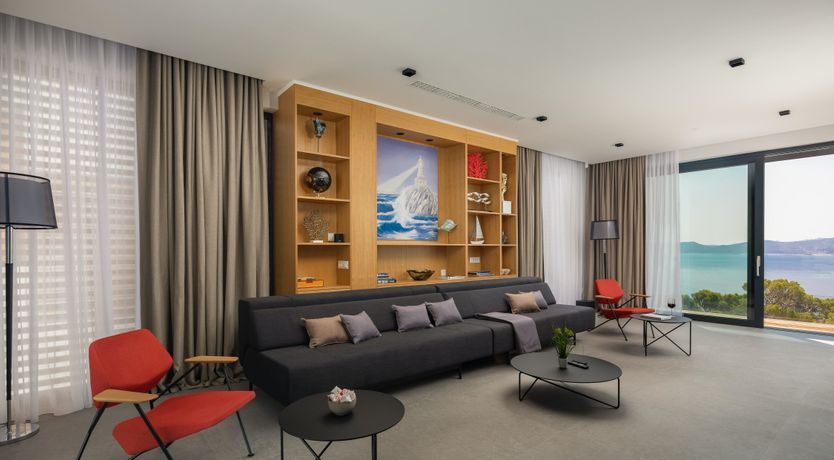 Photo of White Walls & Blue Skies