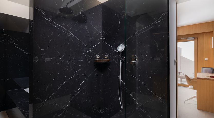 Photo of White Walls & Blue Skies