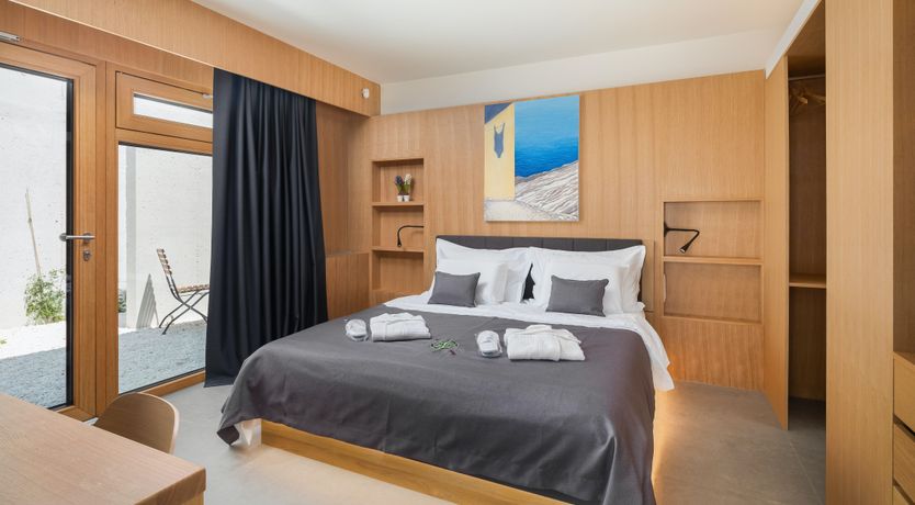 Photo of White Walls & Blue Skies