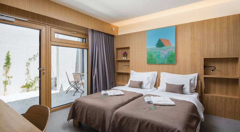 Photo of White Walls & Blue Skies