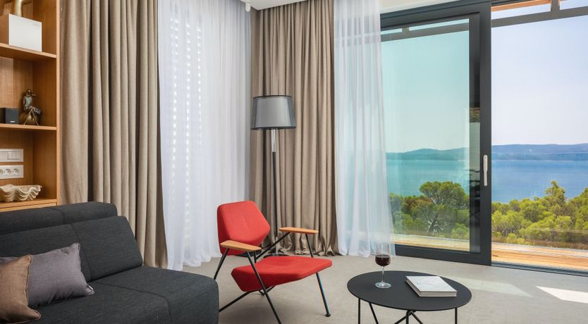 Photo of White Walls & Blue Skies