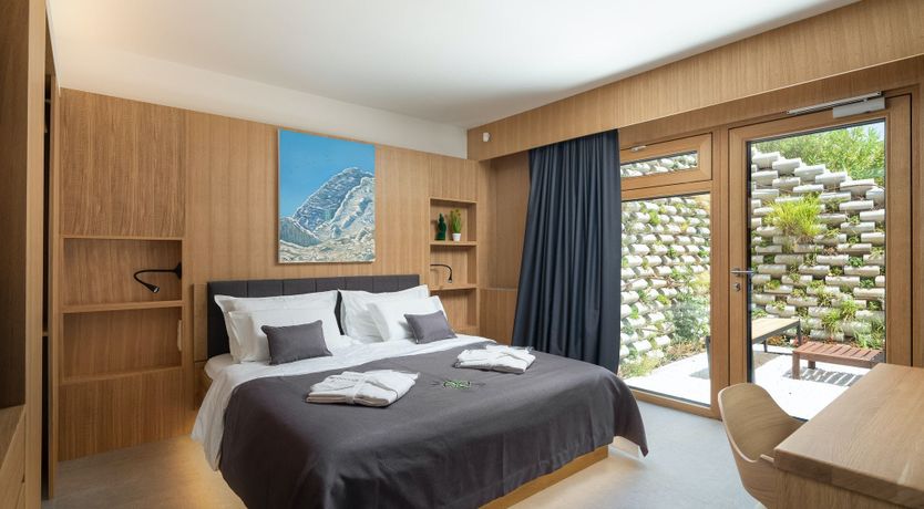 Photo of White Walls & Blue Skies