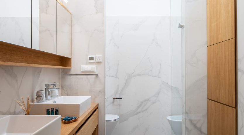 Photo of White Walls & Blue Skies