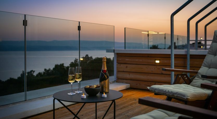 Photo of White Walls & Blue Skies