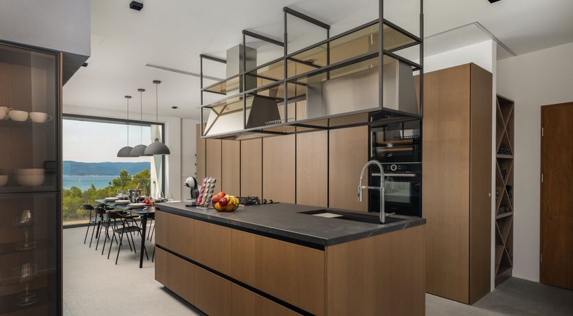 Photo of White Walls & Blue Skies