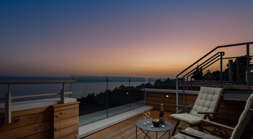 Photo of White Walls & Blue Skies