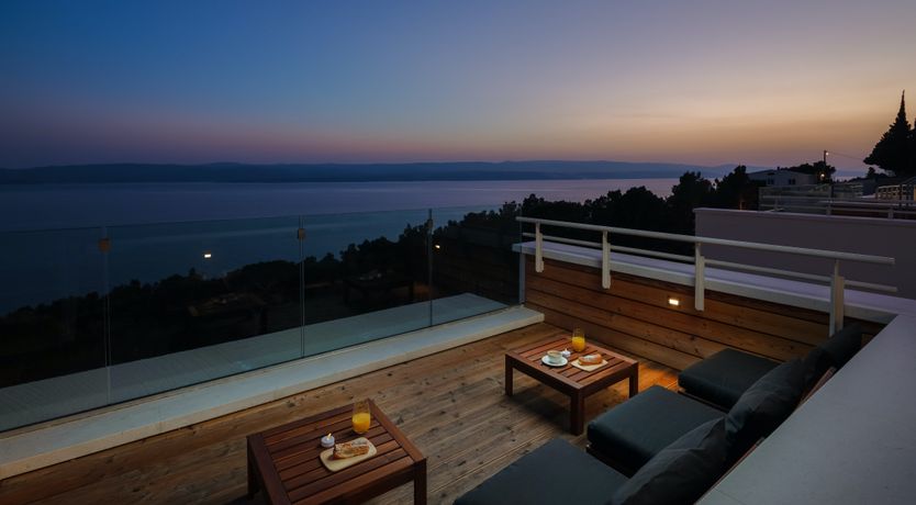 Photo of White Walls & Blue Skies