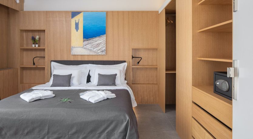 Photo of White Walls & Blue Skies