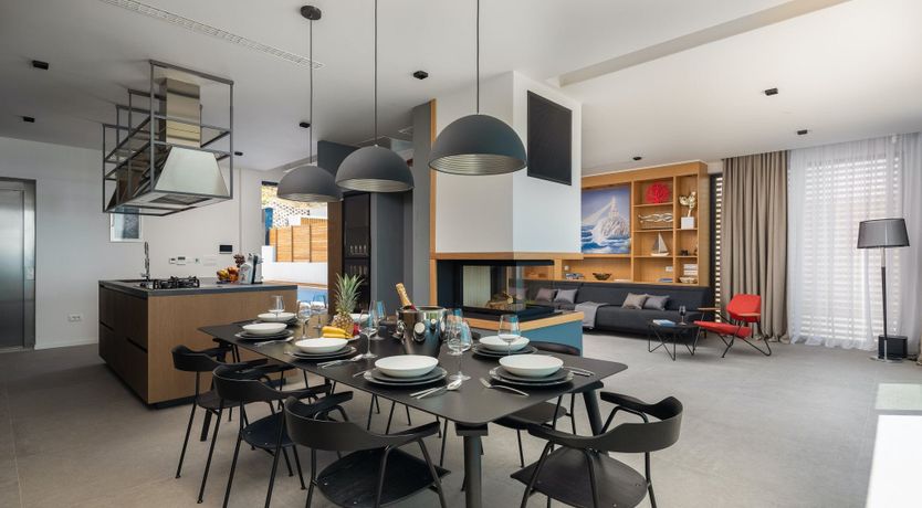 Photo of White Walls & Blue Skies