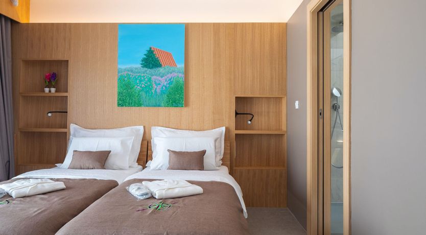 Photo of White Walls & Blue Skies