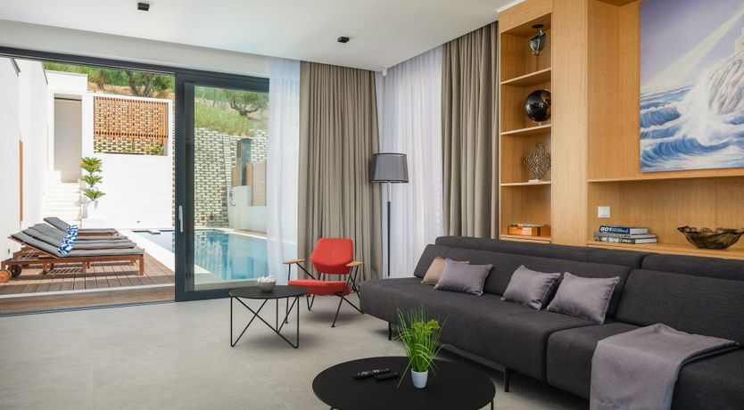 Photo of White Walls & Blue Skies