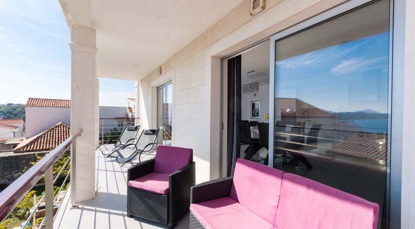 Photo of Plum & White