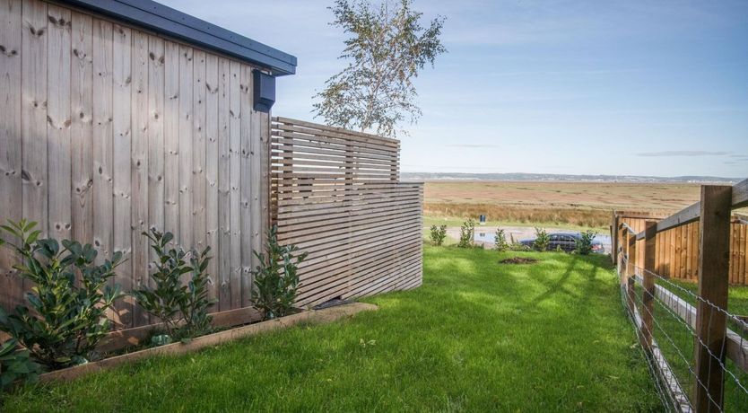 Photo of Across the Marshes to the Sea