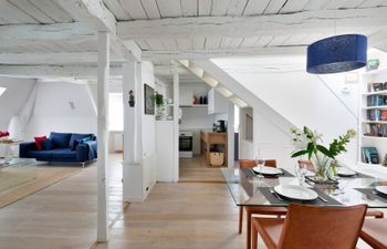 Stone Walls & White Apartment