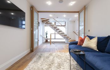 The Winding Glass Stairway Apartment