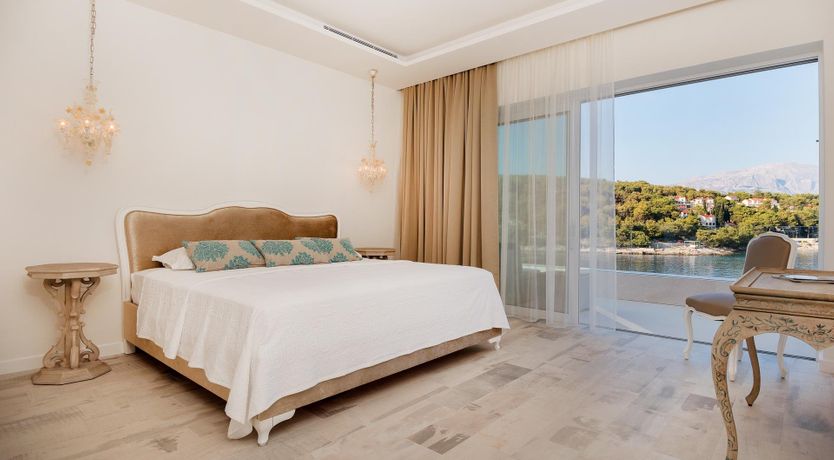 Photo of Sun, Stone & Sea