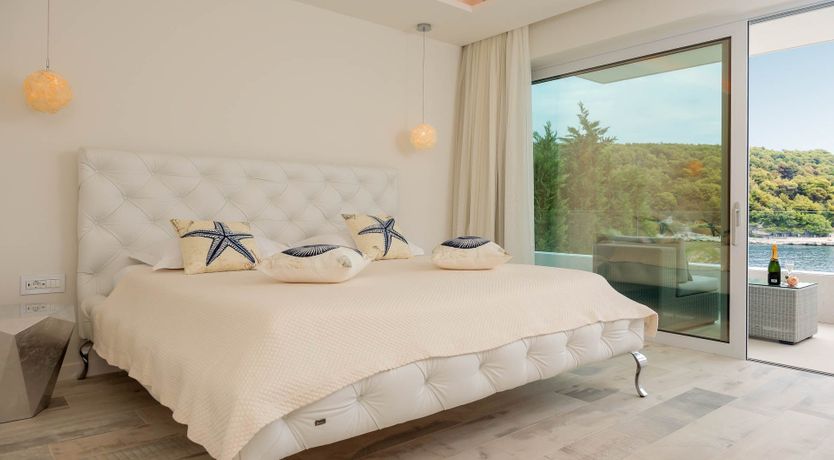 Photo of Sun, Stone & Sea