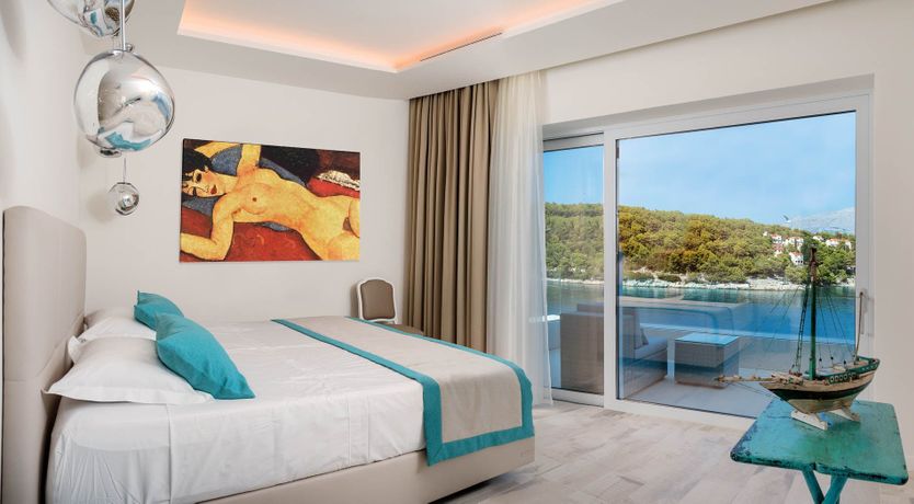 Photo of Sun, Stone & Sea