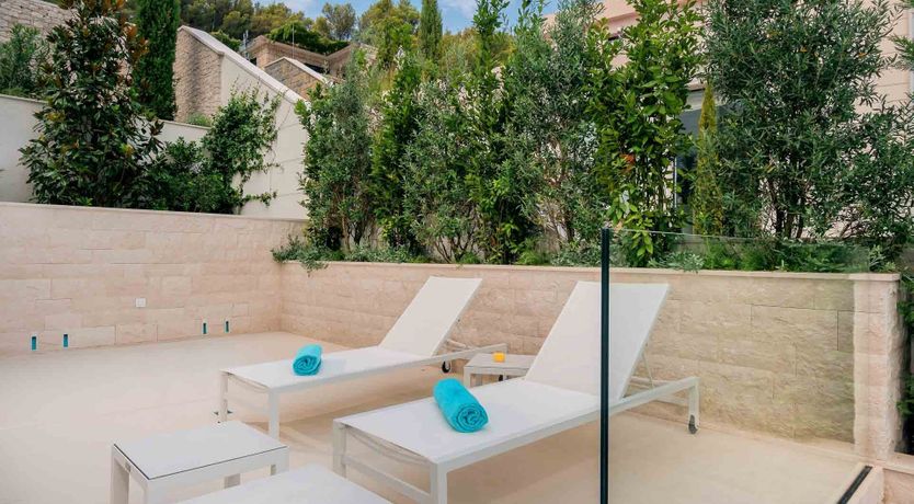 Photo of Sun, Stone & Sea