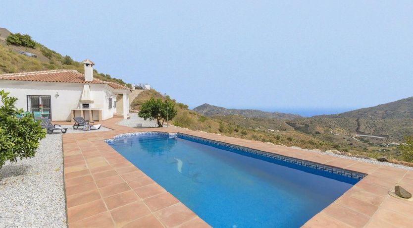 Photo of House on a Hill