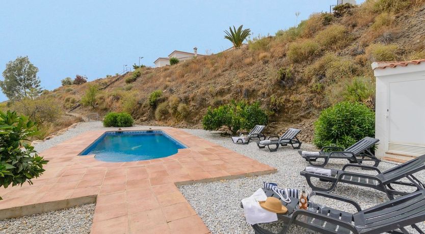 Photo of House on a Hill