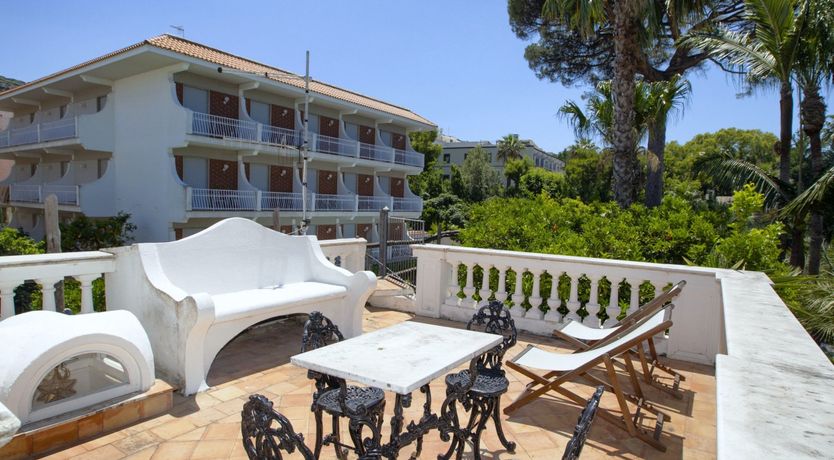 Photo of Palm-Lined Living