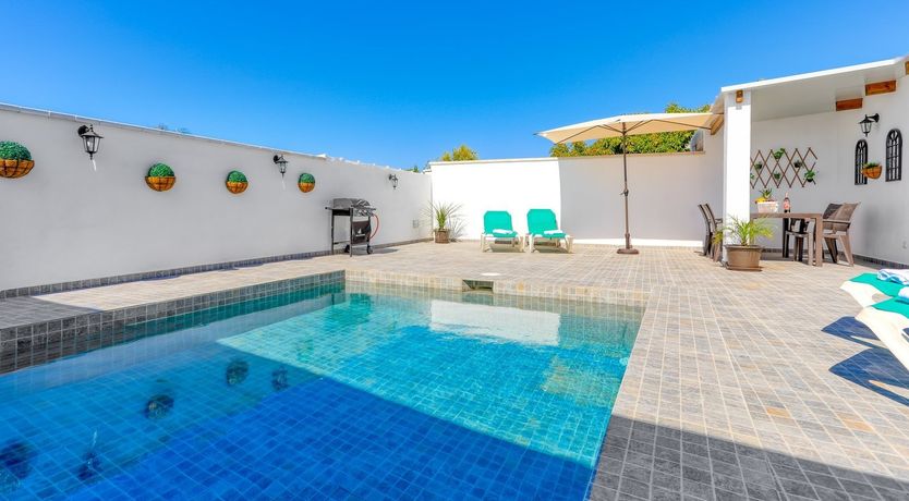 Photo of Beams of Wood & Sun