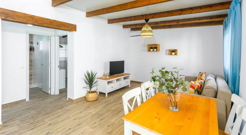 Photo of Beams of Wood & Sun