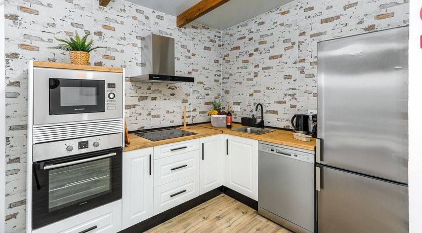 Photo of Beams of Wood & Sun