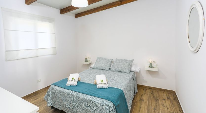 Photo of Beams of Wood & Sun