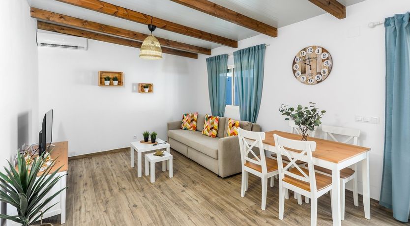 Photo of Beams of Wood & Sun