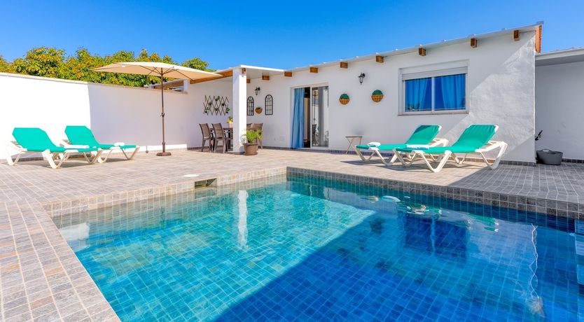 Photo of Beams of Wood & Sun