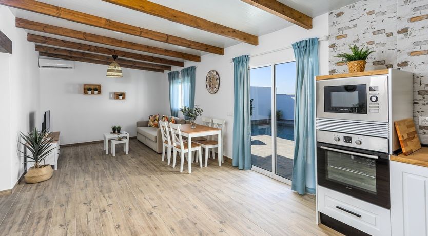 Photo of Beams of Wood & Sun