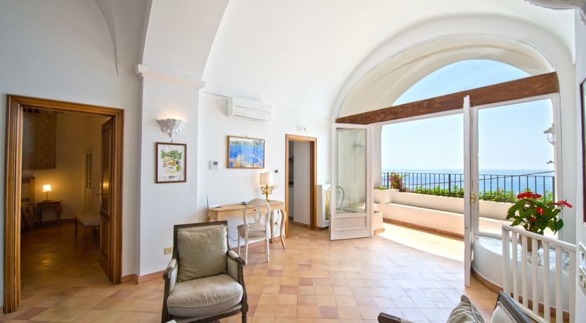 Photo of Arch Above the Sea