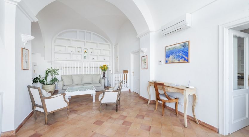 Photo of Arch Above the Sea