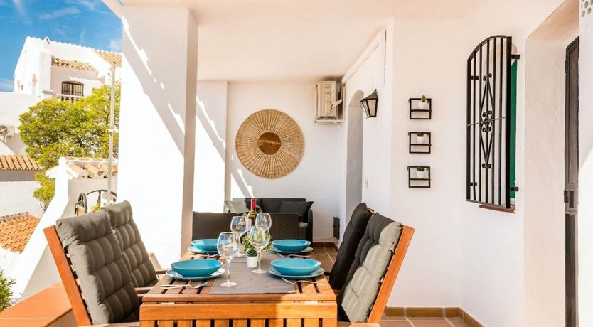 Photo of Tangerine Rooftops