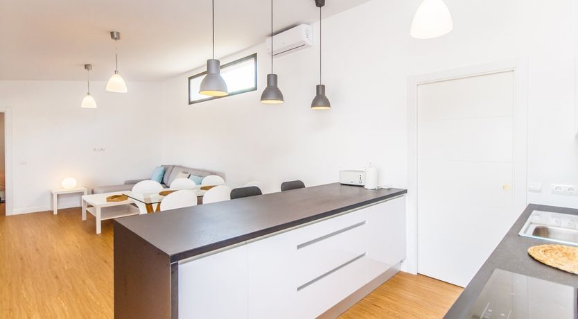 Photo of Between The Palm Leaves