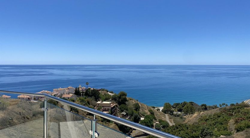 Photo of Over the Glass Balcony