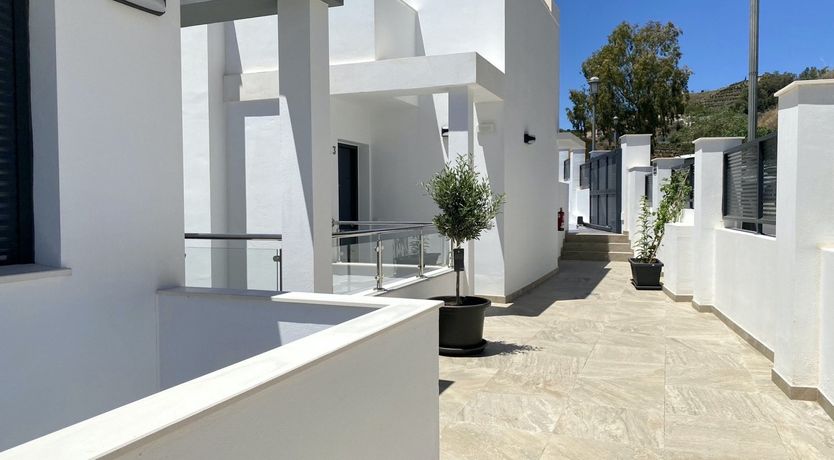 Photo of Over the Glass Balcony