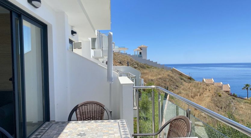 Photo of Over the Glass Balcony