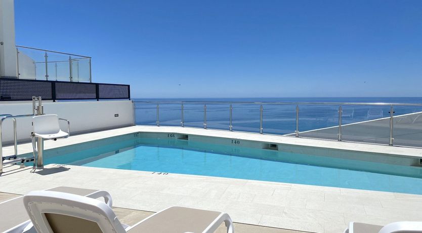 Photo of Over the Glass Balcony