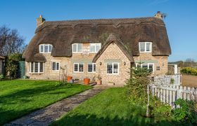 The Thatch House Holiday Cottage