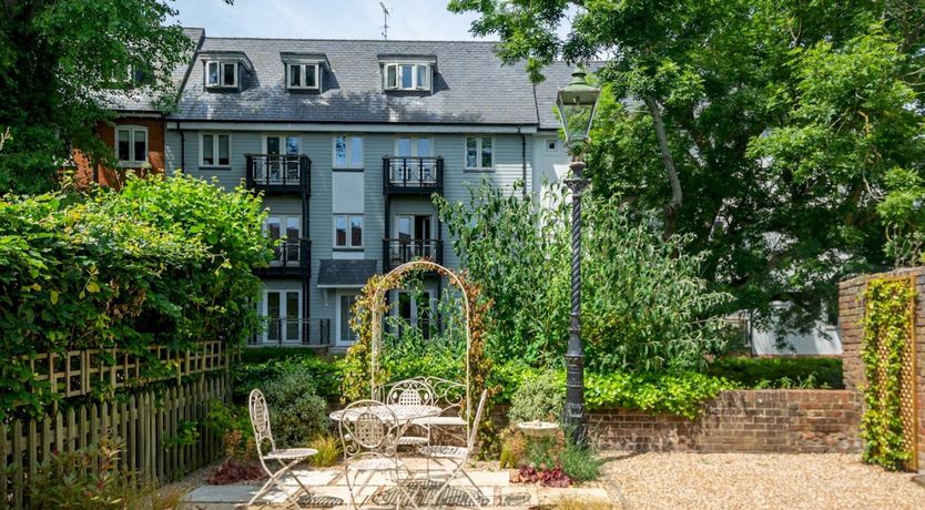 Photo of The River Runs By