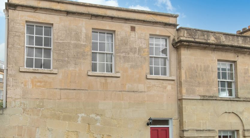 Photo of Behind the Bright Red door