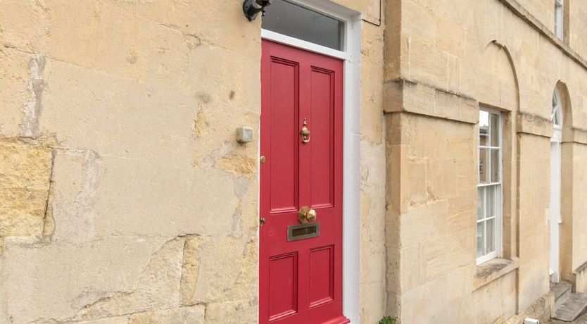 Photo of Behind the Bright Red door