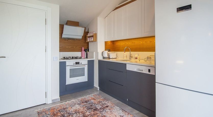 Photo of Old Stone & Leaf