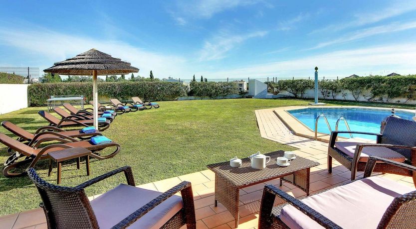 Photo of Serene Seas & Palm Trees