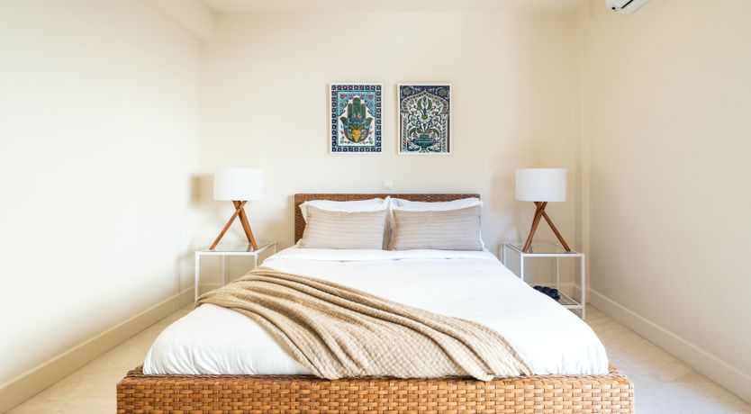 Photo of Between White Columns